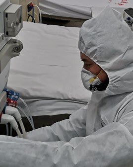 Heathcare worker in China with protective gear